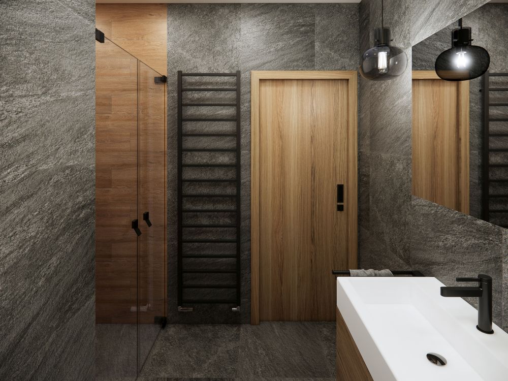 Návrh dvou elegantních koupelen a WC: velkoformátové obklady v imitaci přírodních materiálů, kvalitní sanita a černé doplňky 6