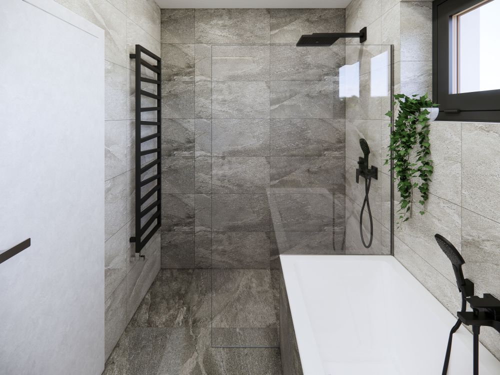 Návrh dvou elegantních koupelen a WC: velkoformátové obklady v imitaci přírodních materiálů, kvalitní sanita a černé doplňky 13