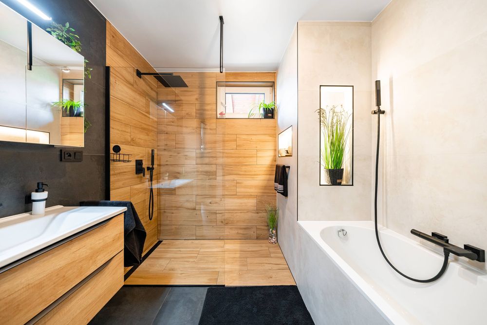 Rekonstrukce koupelny vzhled betonové stěrky a dřeva. Keraservis.